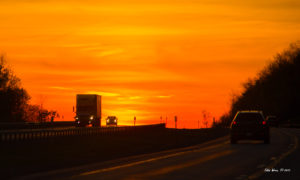 Sunset on US interstate highway I-90. Copyright 2015. All rights reserved.